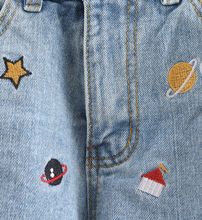 Load image into Gallery viewer, Planets Embroidered Pleaded Jean Shorts
